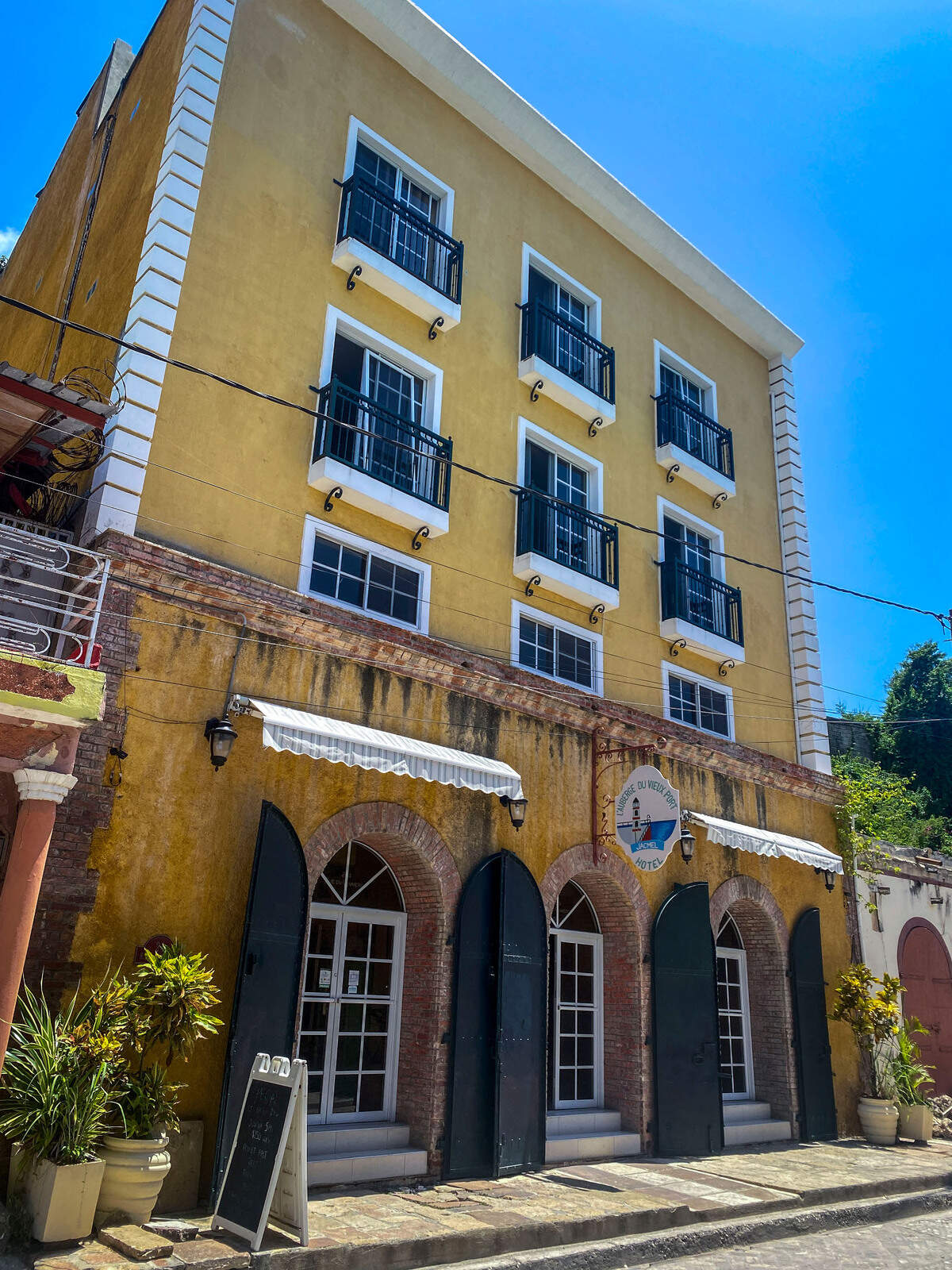Georges Boursiquot and Marguerite Baril-Boursiquot’s boutique hotel L’auberge Du Vieux Port on Rue du Commerce in Jacmel, Haiti. Like many businesses in Haiti, the hotel is struggling to remain open.