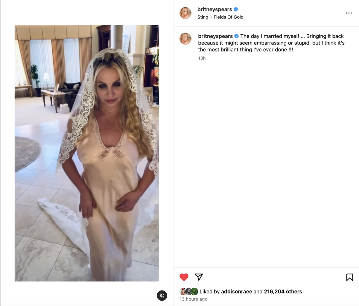 Britney Spears shares video of herself in a white silk dress and veil.