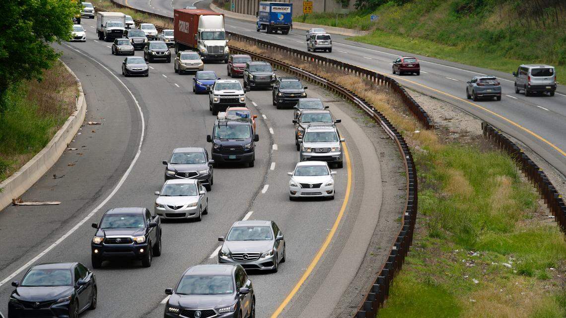 Traffic travels on I-476 on Friday, May 28, 2021, in Springfield, Pennsylvania. A report found the COVID-19 pandemic has driven up the average age of cars in the United States. (AP Photo/Matt Slocum)