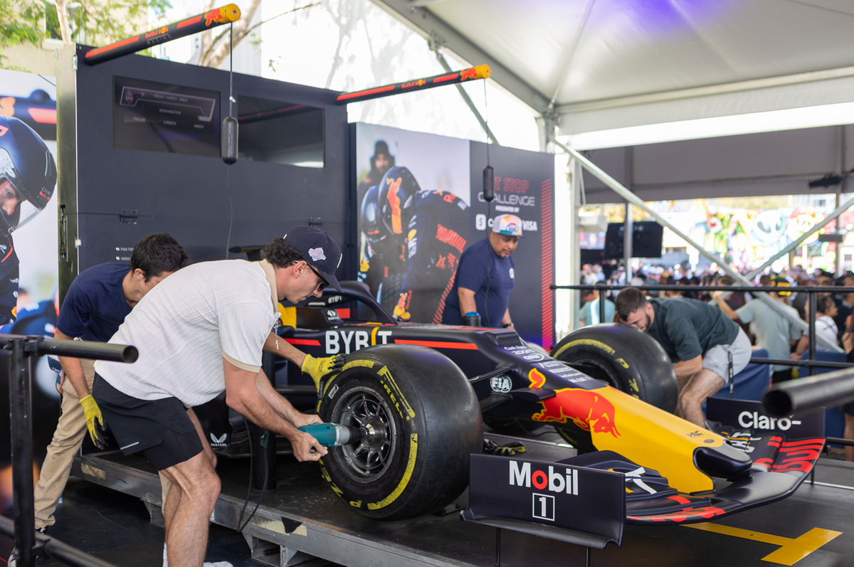 At the Racing Fan Fest Wynwood Marketplace, you can actually change the tire of an F1 car like they do in the pit