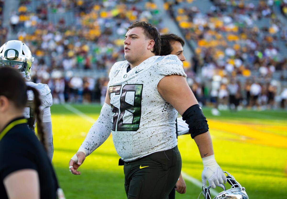 Nov 18, 2023; Tempe, Arizona, USA; Oregon Ducks offensive lineman Jackson Powers-Johnson (58) against the Arizona State Sun Devils at Mountain America Stadium. Mandatory Credit: Mark J. Rebilas-USA TODAY Sports