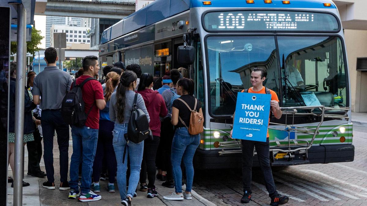 Riders board a #100 bus at the Stephen P. Clark Center in downtown Miami on the first day of the rollout of the Better Bus Network, Monday, November 13, 2023. All rides are free through the end of 2023.