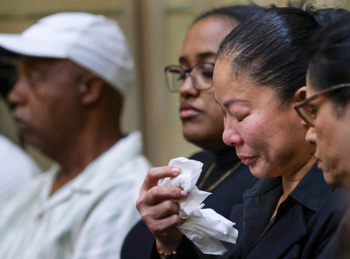 On the right is Aaron's mother Lindsey Ma cries while siting with victims and their supporters as prosecutors described Aaron's killing during Ragan's sentencing trial. Anthawn Ragan Jr., who went on a murder and robbery spree in 2013, appears in Courtroom 4-6 for his death penalty sentencing for the killing of a 10-year-old boy during a nail salon robbery on Monday, February 9, 2026, at the Richard E. Gerstein Justice Building in Miami, Florida. Ragan waived his right to a jury trial, meaning Miami-Dade Circuit Court Judge Marisa Tinkler Mendez will decide on whether he gets life or death.