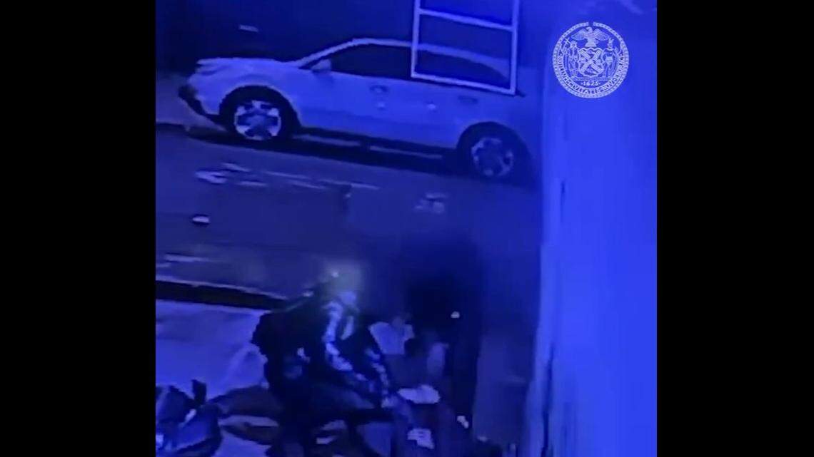 Surveillance video shows two masked men attacking an off-duty NYPD officer May 24 in the Bronx, according to authorities.