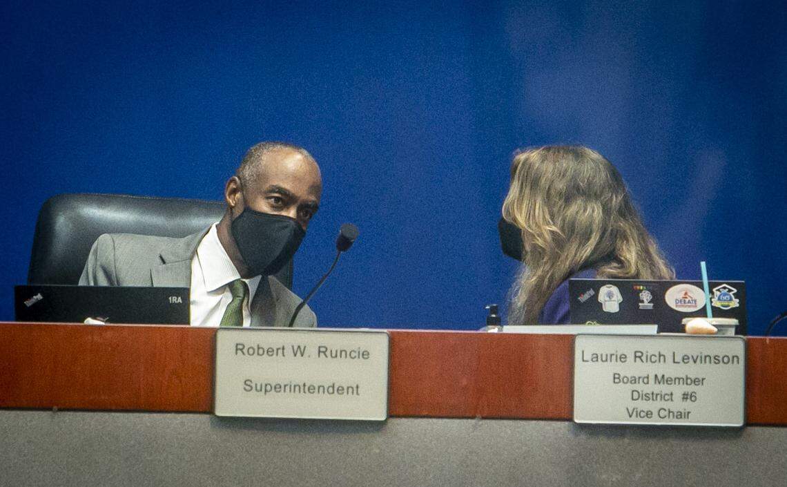 Broward Schools Superintendent Robert W. Runcie, left, talks to Broward School Board Vice Chair Laurie Rich Levinson before the start of the School Board meeting. The board convened a special meeting Thursday, April 29, 2021, so it can authorize the chair and the lawyers to begin a termination agreement with Runcie, who offered to resign on Tuesday following his April 15 indictment on a perjury charge related to a statewide grand jury investigation.