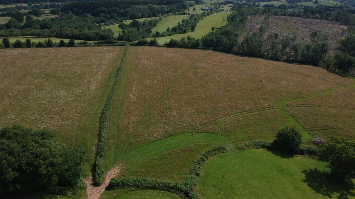 Two people searching a field found a collection of treasure buried 2,800 years ago in a ritual, archaeologists said. Photo shows a representative field in Wales.
