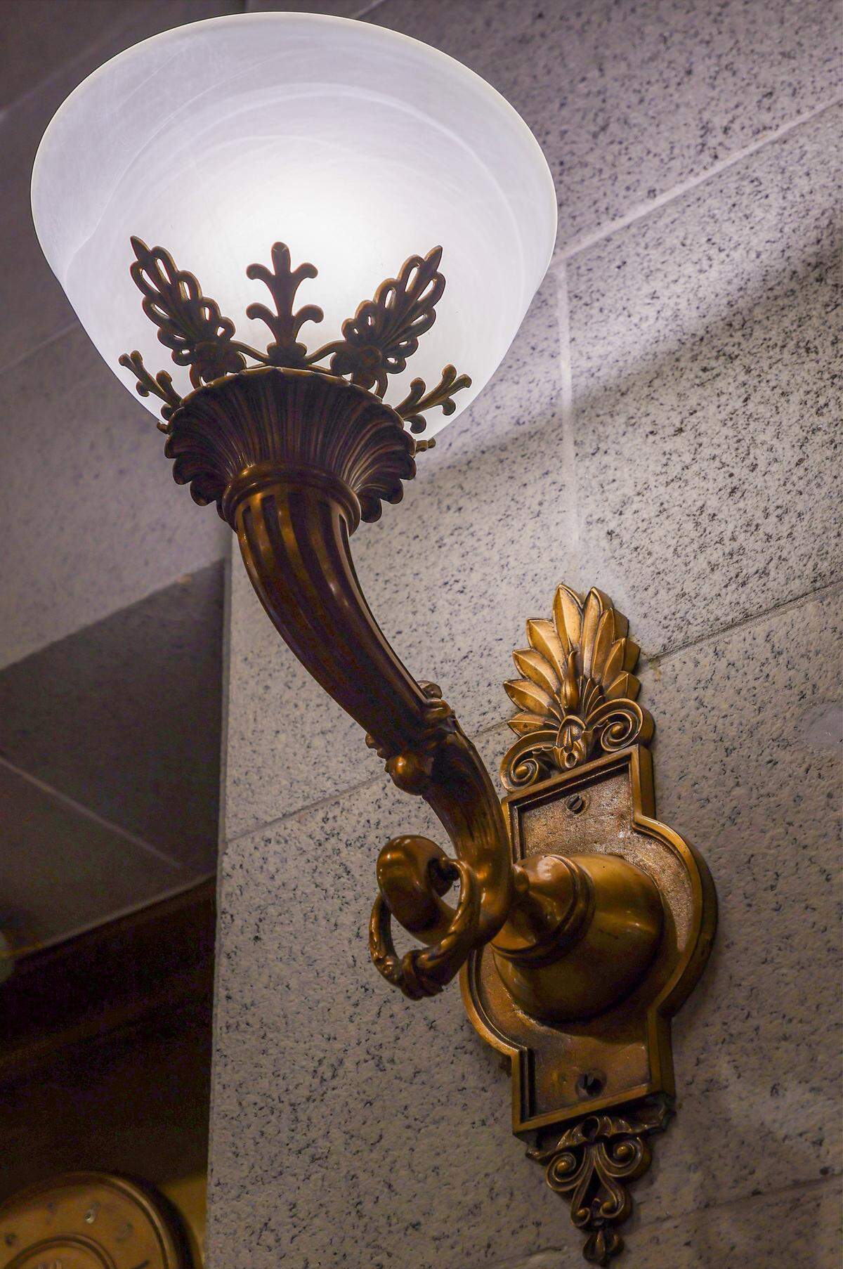 The historic Dade County Courthouse brass lighting fixtures are one of the many historic elements of the old courthouse in Miami, Florida, on Wednesday, January 14, 2026. The Dade County Courthouse is significant as an excellent example of Neo-Classical architecture. The detailing of the remaining historic interior spaces and features continue to reflect this distinctive style and contributes to a more complete understanding of the historic character of the Courthouse.
