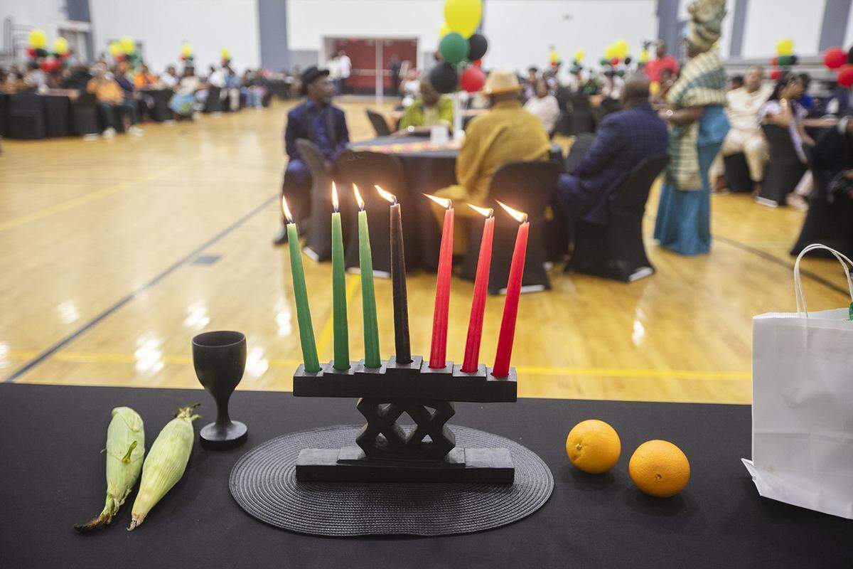 A view of the kinara with candles glowing during ae Kwanzaa celebration at the Samuel K. Johnson Youth Center in 2024.