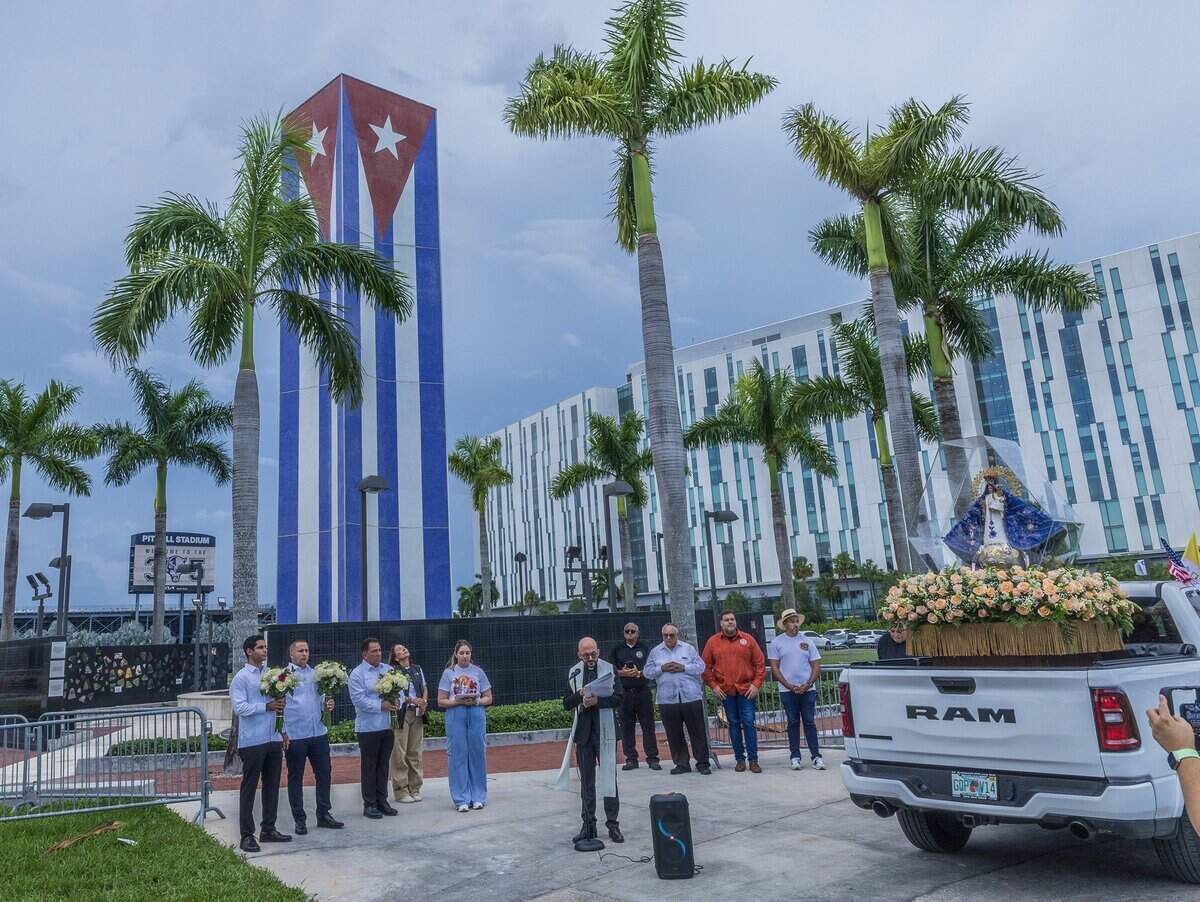 Parishioners and priest celebrated a prayer at the Cuban Memorial Monument as a vehicle procession arrived with the blessed statue of Our Lady of Charity ahead of the celebration of a Solemn Mass celebrating the 65th Anniversary of the Arrival of the Image of Our Lady of Charity in Miami, presided over by Reverend Thomas Wenski, Archbishop of Miami celebrated at the Miami-Dade Fair & Exposition, in West Miami, on Tuesday September 08, 2026.