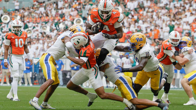 PHOTO GALLERY: Top-ranked Miami Hurricanes improved to 7–0 with a 52–23 victory over the Pittsburgh Panthers