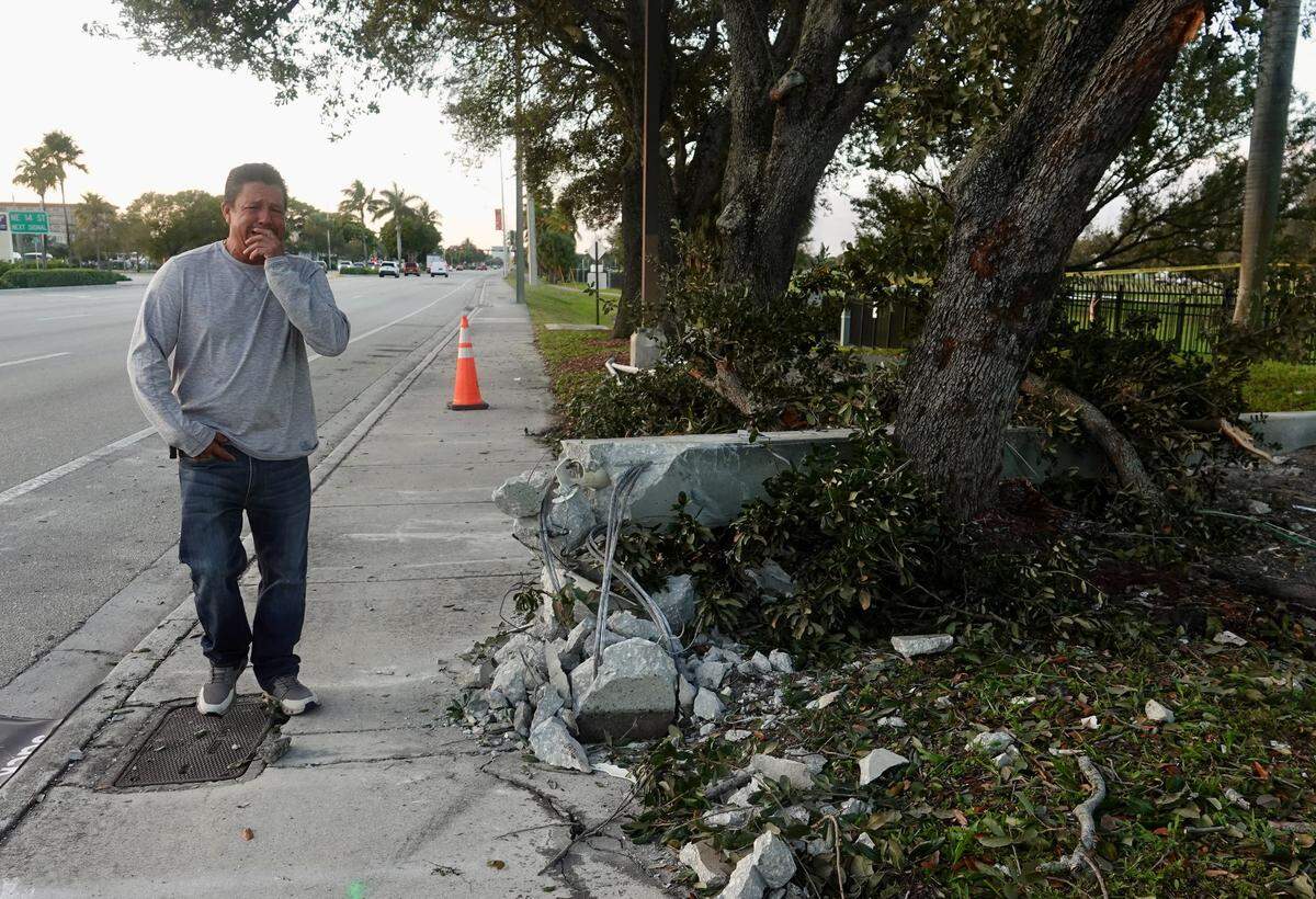 Juan Alcocer, father of Richard Manuel Alcocer, 18, arrives at the bus stop on Tuesday, a day after his son died in a crash at the site on North Federal Highway in Pompano Beach, Tuesday, Dec. 30, 2025. Alcocer was heard saying, “Mi hijo, mi hijo,” as he stood near the site where the boys, ages 15, 16, and 18, died after their vehicle struck a light pole and bus stop. (Joe Cavaretta/South Florida Sun Sentinel)