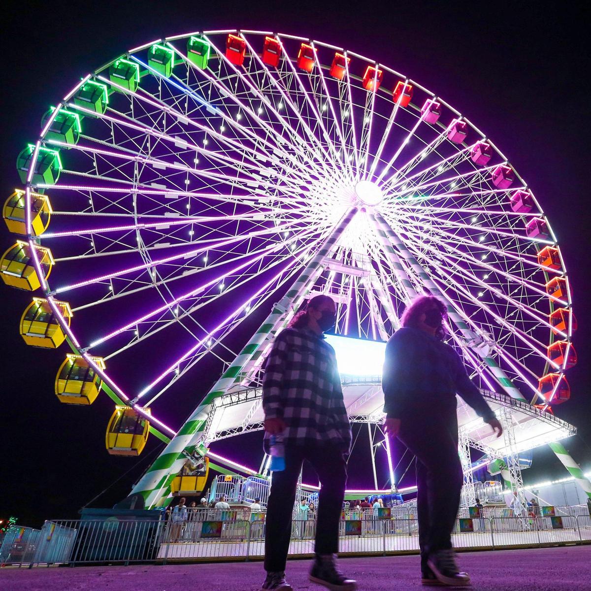 The rainbow-colored Ferris wheel inside Santa’s Enchanted Forest.