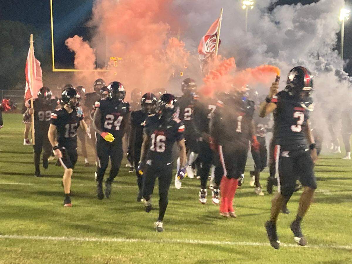 Miami Southridge runs out on to the field for its Region 4-6A final against West Broward on Friday night at Southridge Stadium.