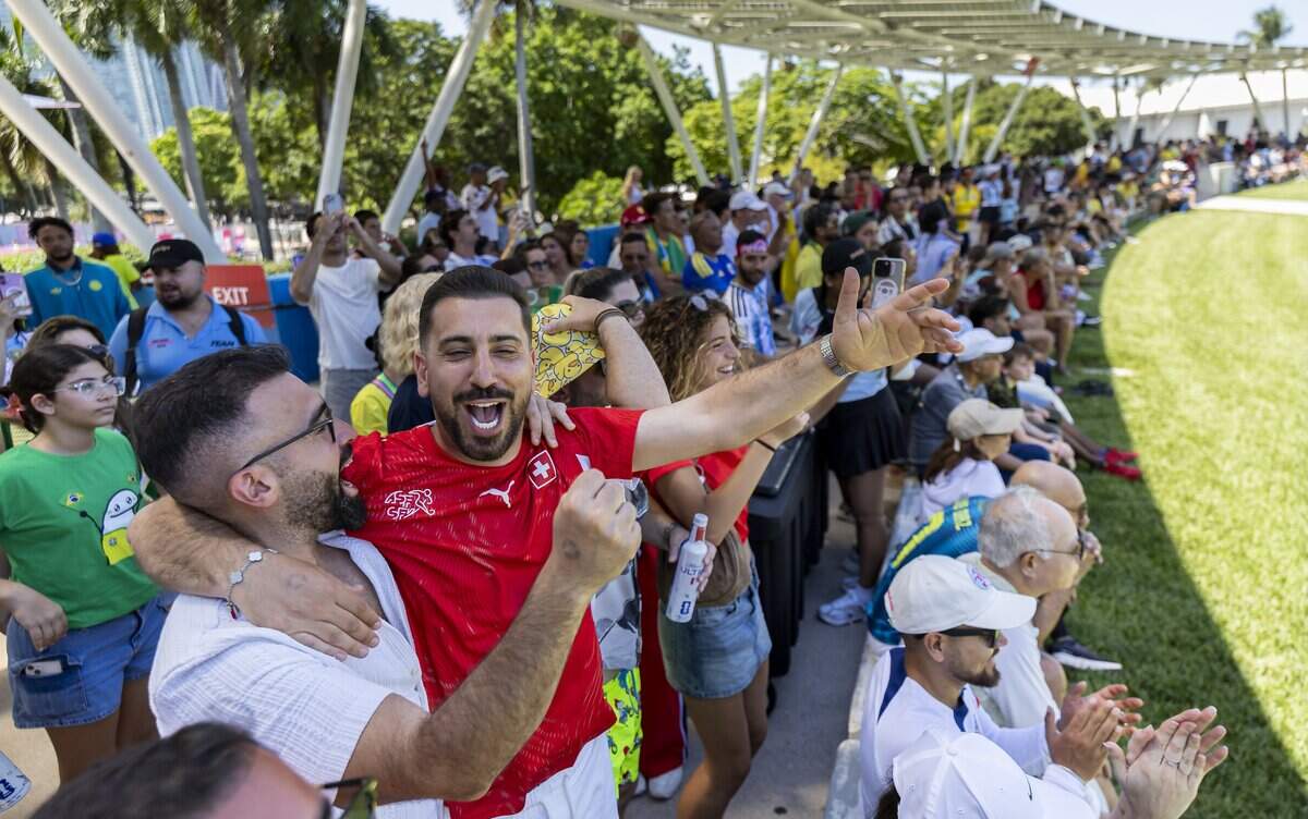 Alex Yildiz, left, and Michel Sert, celebrate after Switzerland scored a penalty goal against Qatar during the FIFA Fan Festival Miami at Bayfront Park on Saturday, June 13, 2026, in downtown Miami, Fla.