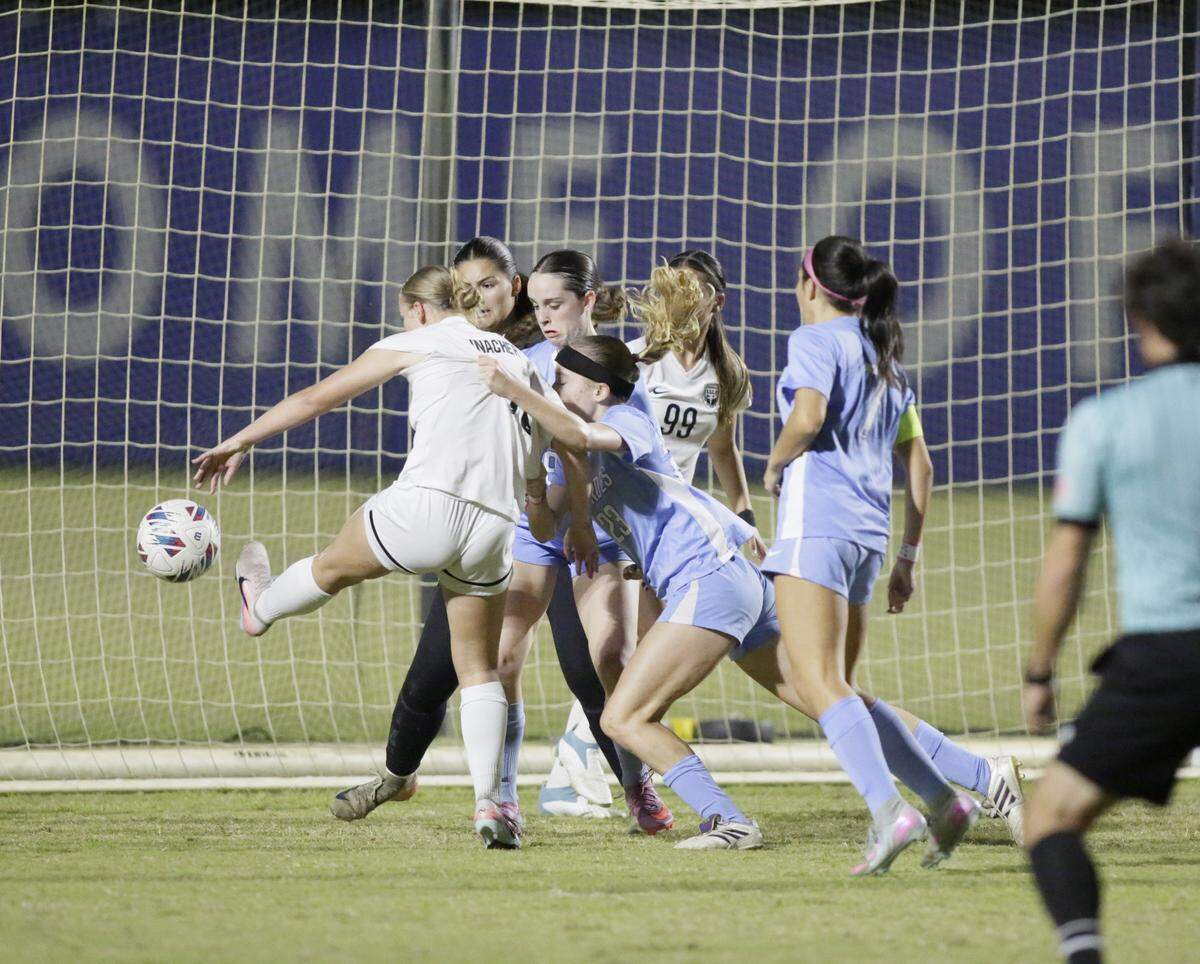 A Pembroke Pines Charter player attempts to score against Lourdes Academy during the Region 4-5A final girls’ soccer match on Tuesday, Feb. 17, 2026, at Miami Dade College’s Kendall Campus in Miami.
