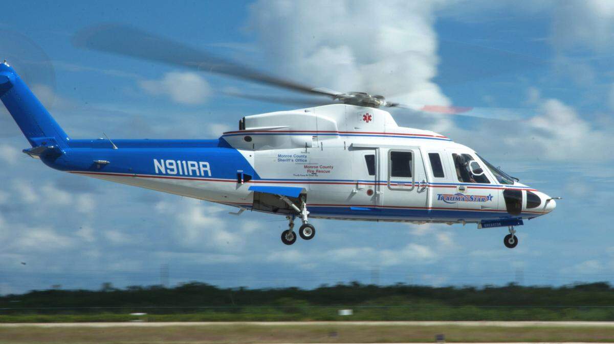 Monroe County’s helicopter, an air ambulance, Trauma Star, hovers over a runway in this undated photoe. The helicopter landed on the Seven Mile Bridge in Marathon Thursday, May 18, 2023, to take a man to a Miami-Dade County hospital who was bitten on the leg by a shark, according to the sheriff’s office.