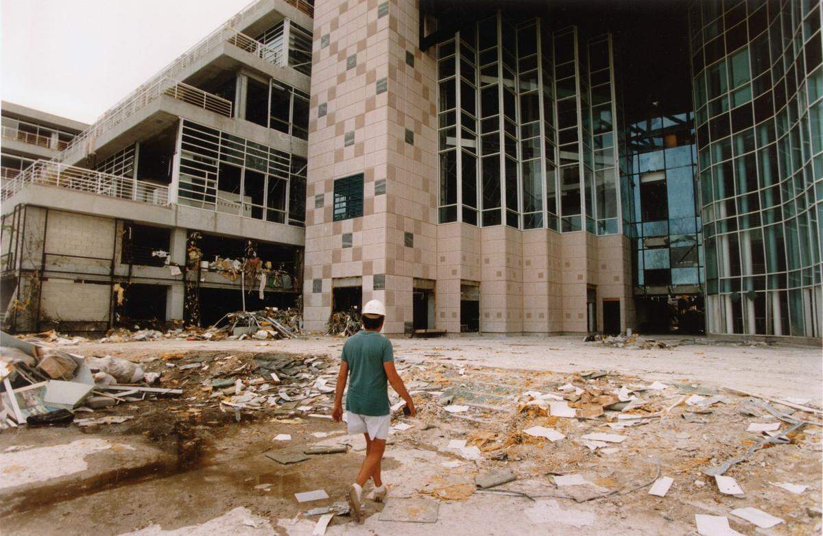 In 1992, Larry Offutt, Loss Control Manager for Burger King, surveys the damage from Hurricane Andrew to the company’s headquarters in what is now the village of Palmetto Bay. Burger King moved out in 2002.