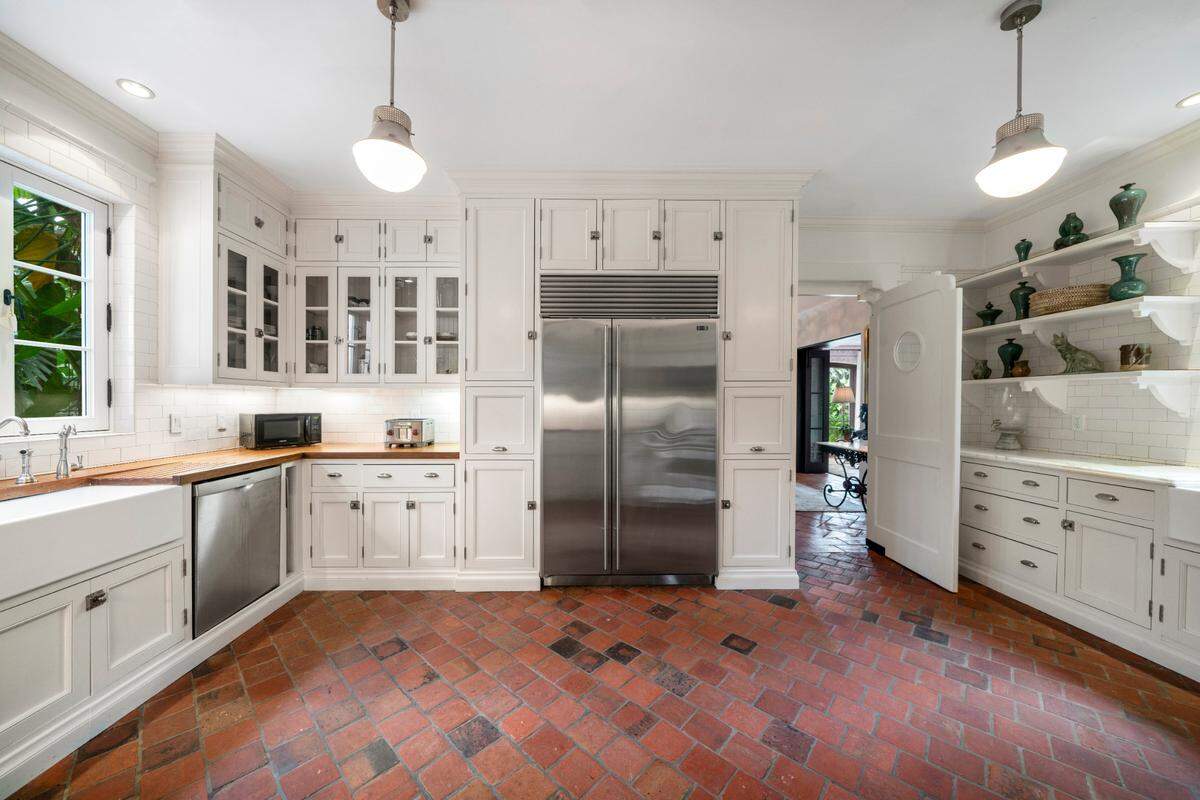 Extensive renovations were made at this historic mansion in the Grove, including an updated kitchen.