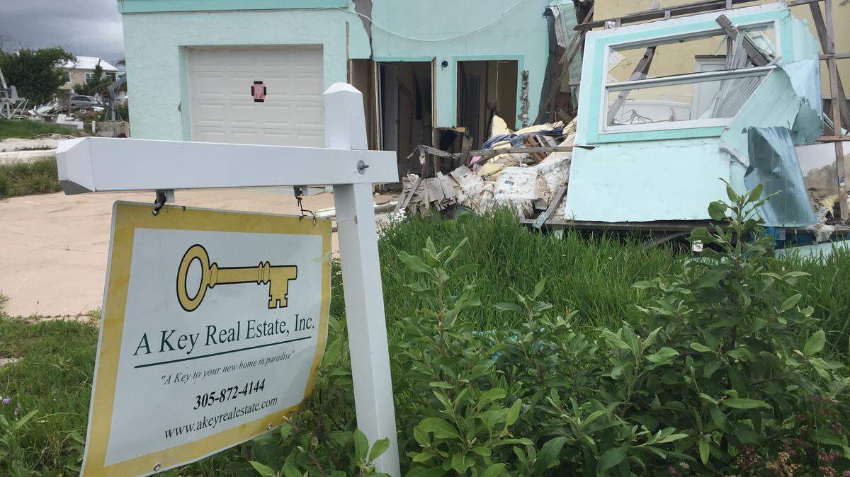 In Big Pine Key, one of the areas in the Florida Keys hardest hit by Hurricane Irma, wrecked homes still line the roads nearly nine months later. Some sport ‘for sale’ signs, a popular option on the working class island for those who can’t afford to rebuild.