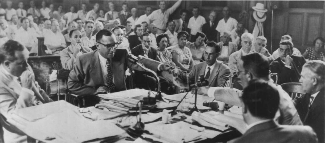 Sen. Estes Kefauver’s Crime Investigation Committee Hearing in 1950 questions Dade County Sheriff Jimmy Sullivan, who passes the committee a picture.