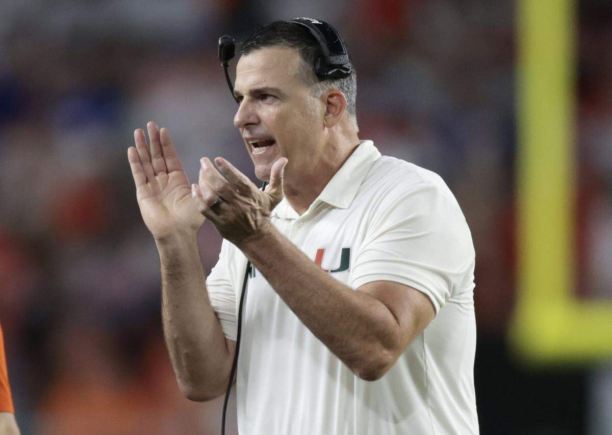 Miami Hurricanes head coach Mario Cristobal on the field during the game against the Florida Gators.