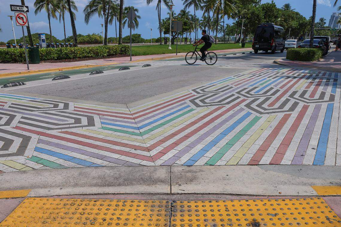 Rainbow-colored crosswalks are painted at the intersection of 12 Street and Ocean Drive in Miami Beach, Florida on Thursday, August 20, 2025. These decorated crosswalks have been become controversial throughout S. Florida.