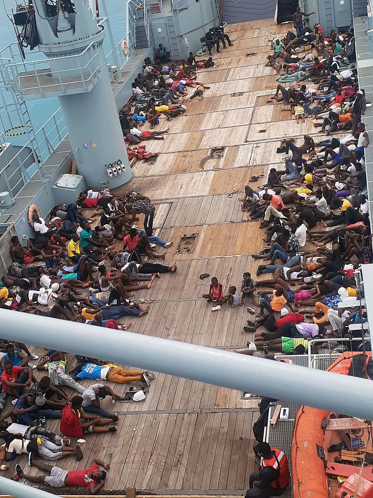 About 400 Haitian migrants were apprehended Sept. 26, 2021 off an uninhabited cay in the southern Bahamas after their green and yellow wooden sloop partially submerged.