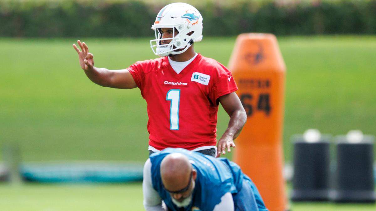 Miami Dolphins quarterback Tua Tagovailoa (1) do drills during NFL football training camp at Baptist Health Training Complex in Hard Rock Stadium on Wednesday, July 27, 2022 in Miami Gardens, Florida.