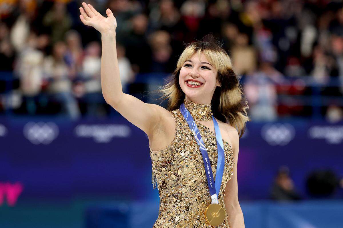 MILAN, ITALY - FEBRUARY 19: Gold medalist Alysa Liu of Team United States poses for a photo during the medal ceremony for the Women's Single Skating on day thirteen of the Milano Cortina 2026 Winter Olympic games at Milano Ice Skating Arena on February 19, 2026 in Milan, Italy. (Photo by Matthew Stockman/Getty Images)