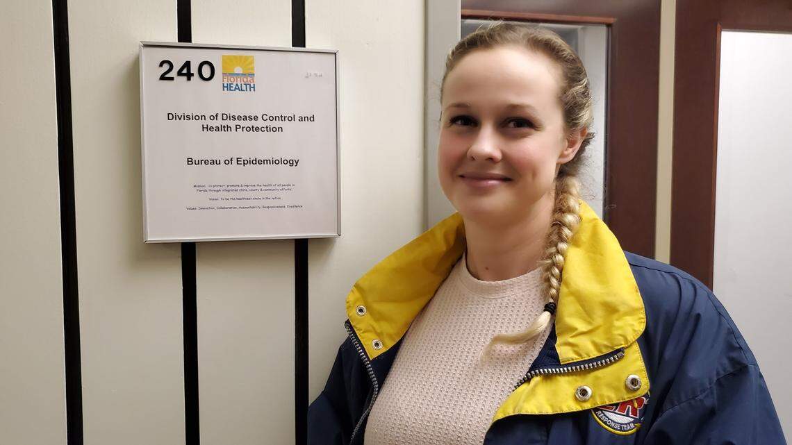 Rebekah Jones stands outside her office at the Florida Department of Health, where she built the COVID-19 data dashboard.