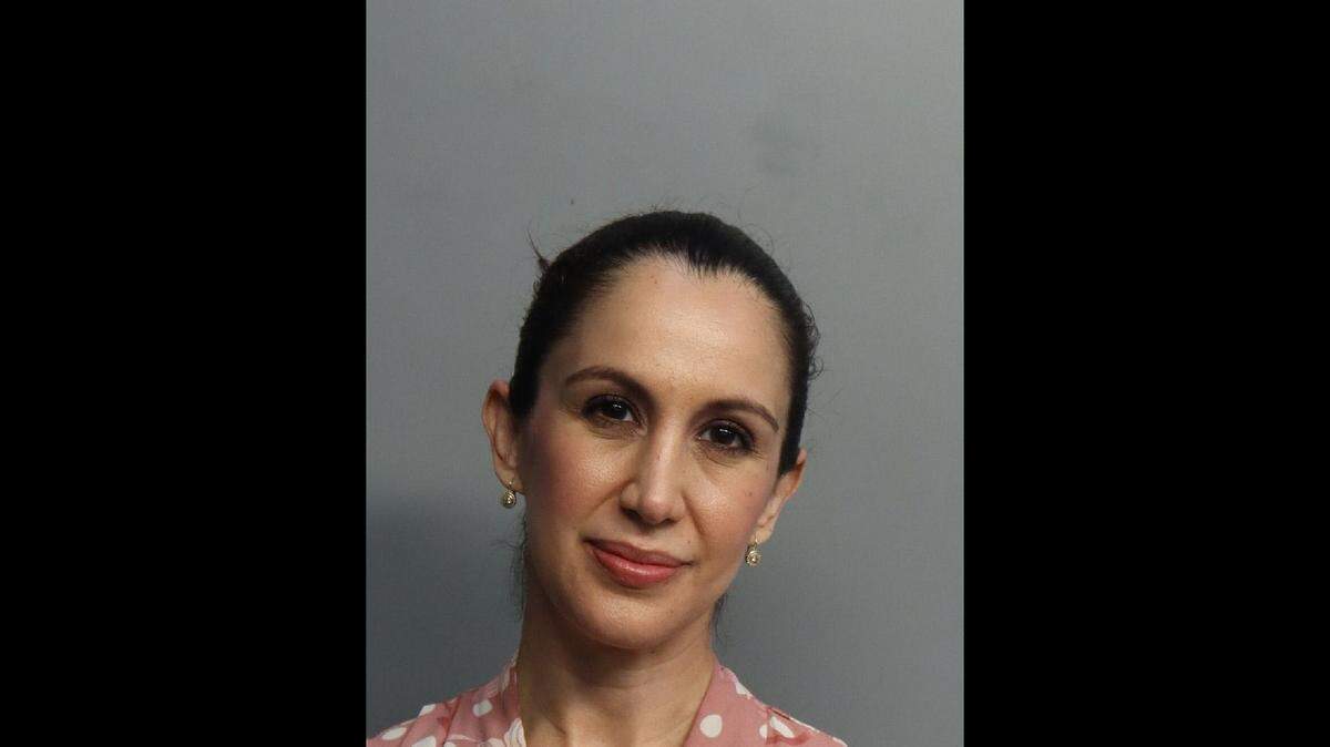 Heiry Calvi, 41, John I. Smith K-8 Center teacher, was charged with having an inappropriate relationship and sex with a 15-year-old former student, police say.