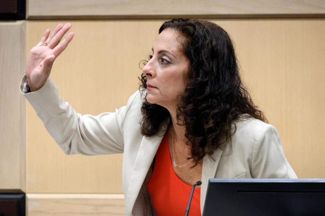 Assistant State Attorney Michelle Boutros sworn in to testify as a witness during a hearing in the trial of Jamell Demons, better known as rapper YNW Melly, at the Broward County Courthouse in Fort Lauderdale on Friday, Oct. 6, 2023. Defense lawyers say she overheard Miramar Police Detective Mark Moretti, the lead investigator on Demons’ case, express a willingness to lie about his seizure of a phone belonging to Demons’ mother, Jamie King, during a Fort Lauderdale courthouse interview last October. (Amy Beth Bennett / South Florida Sun Sentinel)