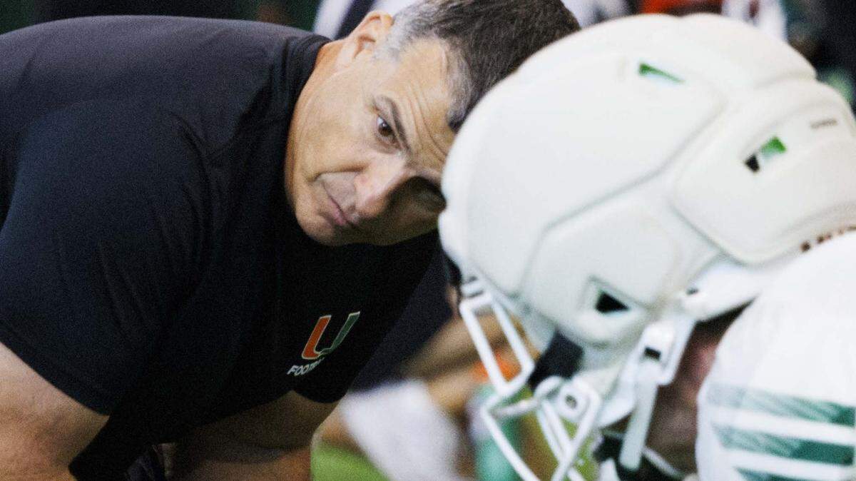 Head coach Mario Cristobal watches his players during Miami Hurricanes football practice on Monday, Aug. 4, 2025, at University of Miami in Coral Gables, Fla. 