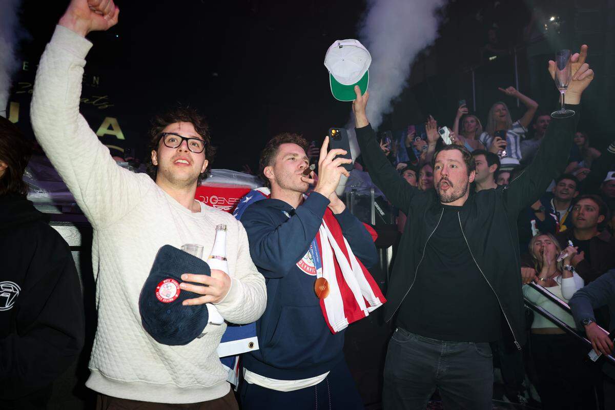 MIAMI, FLORIDA - FEBRUARY 23: Brock Faber, Matthew Tkachuk, and J.T. Miller attend a celebration of the USA Men's Hockey Team's Olympic Gold at E11EVEN Miami on February 23, 2026 in Miami, Florida.  (Photo by Alexander Tamargo/Getty Images for E11EVEN Miami)