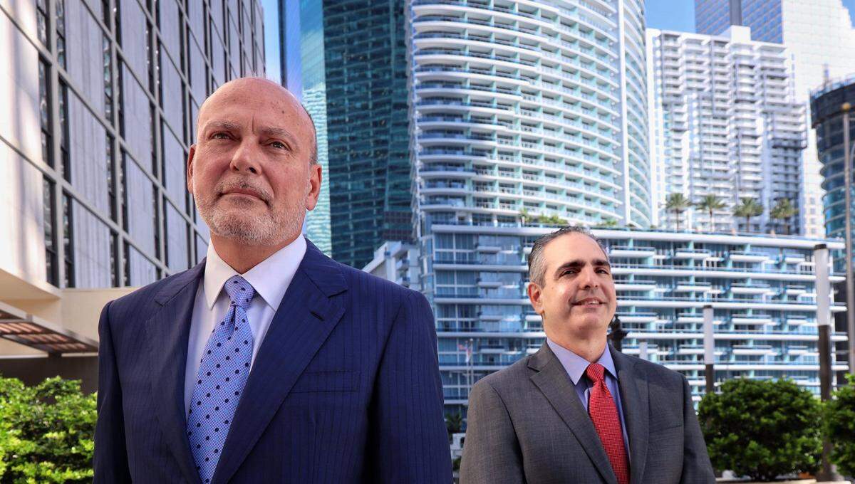 Steve Patterson, left, president and CEO of Related Development, and Alberto Milo Jr., right, president of the Related Urban, stand at the site of a planned Related Group rental apartment and condo development project at 444 Brickell in Miami, Florida on Tuesday, October 27, 2020.