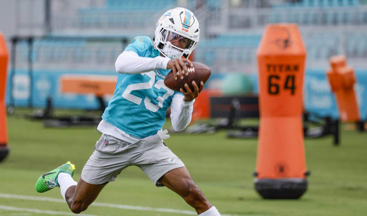 Miami Dolphins cornerback Jack Jones (23) catches a pass during practice at the Miami Dolphins Training Camp in Miami Gardens, Florida, on Tuesday, August 26, 2025.