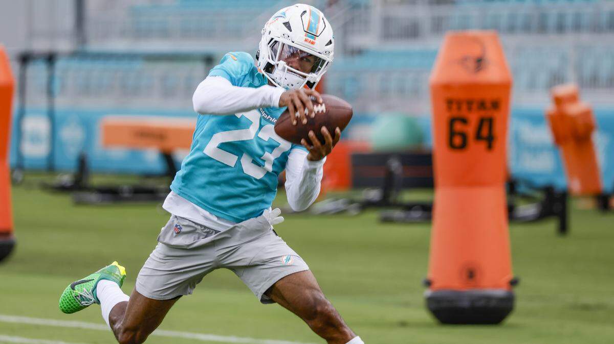 Miami Dolphins cornerback Jack Jones (23) catches a pass during practice at the Miami Dolphins Training Camp in Miami Gardens, Florida, on Tuesday, August 26, 2025.