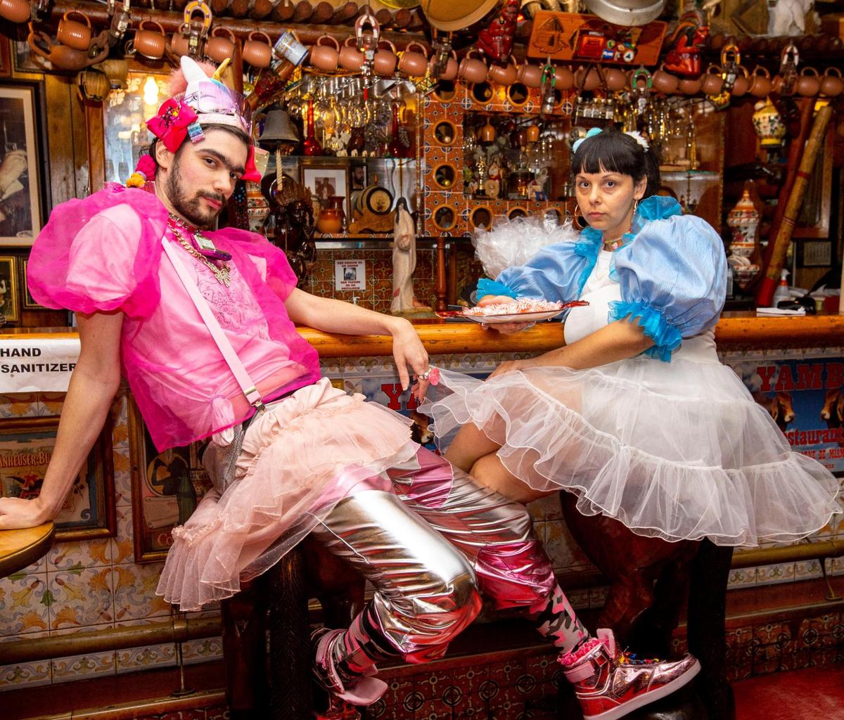 Liz Ferrer and Bow Ty, two Miami-based visual artists and reggaetoneras, pose at Yambo, a beloved Nicaraguan restaurant in Miami, Florida, on Tuesday, March 29, 2022. Liz and Bow teamed up to form Niña, a femme reggeaton duo. Their first music video for their song “Dame Leche” was released in March.