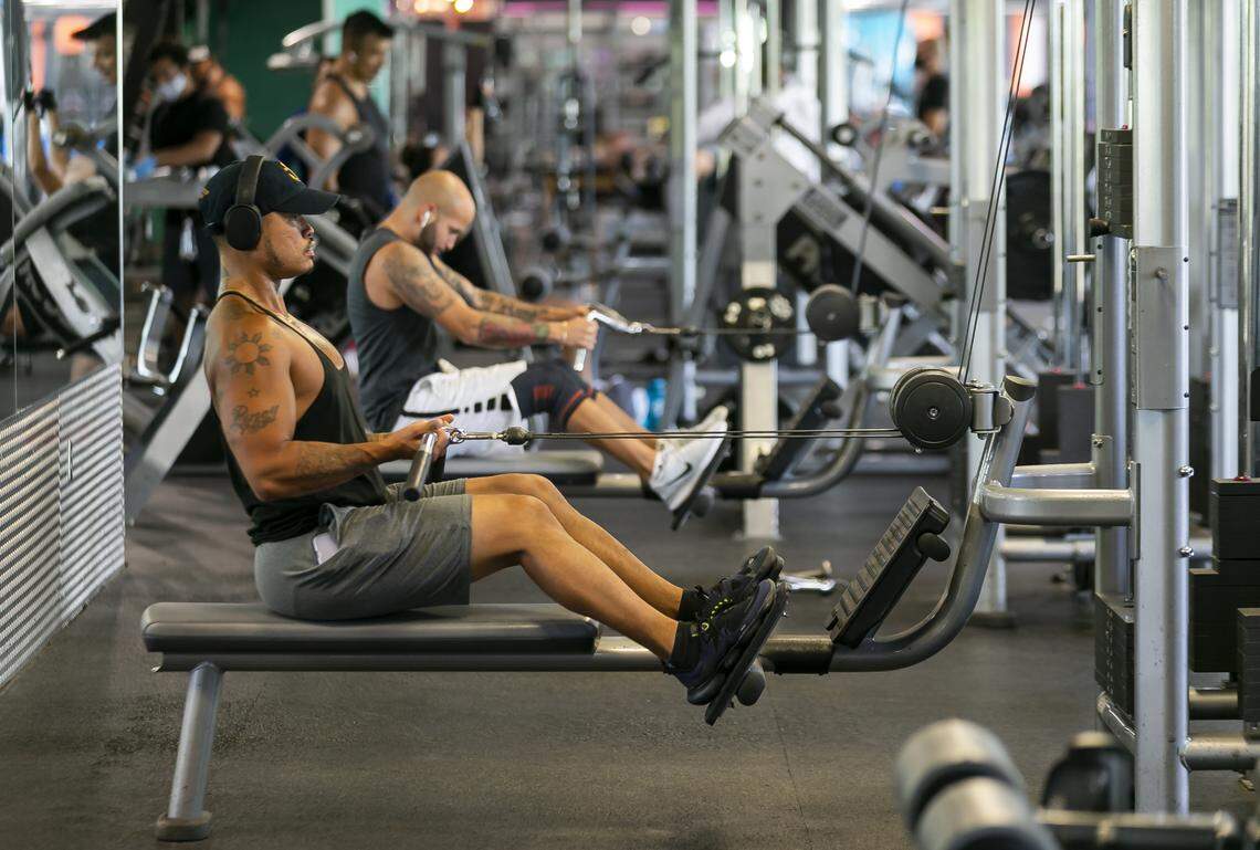 Justin Liwanag, 33, exercises at a Crunch Fitness in Miami Beach, Florida on Monday, June 8, 2020. Miami-Dade officials lifted a ban that prevented gyms from operating because of the coronavirus pandemic.