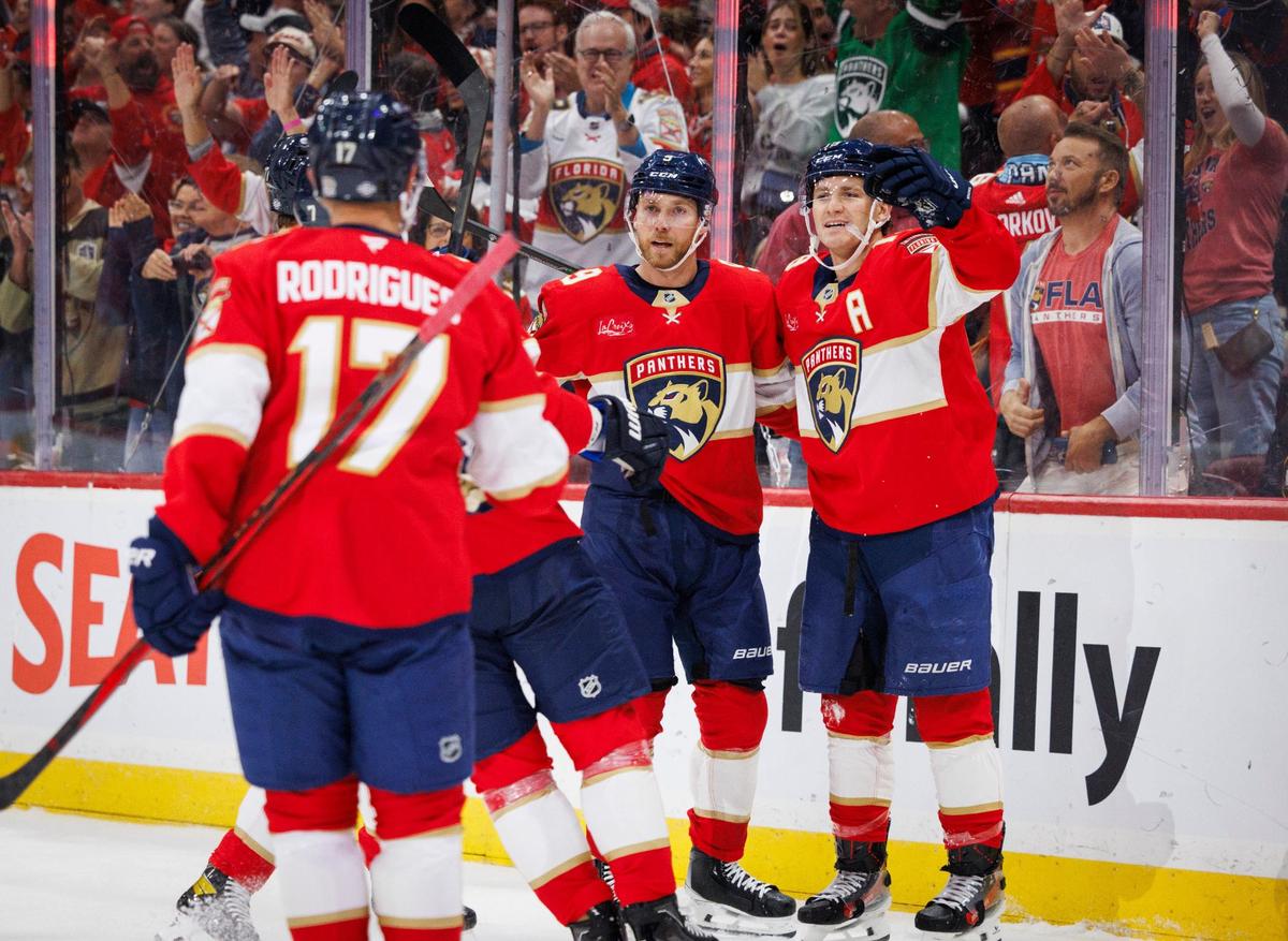 Florida Panthers center Sam Bennett (9) and teammates celebrate his goal during the first period the home opener of the Florida Panthers against the Boston Bruins on Tuesday, Oct. 8, 2024, at Amerant Bank Arena in Sunrise, Fla.