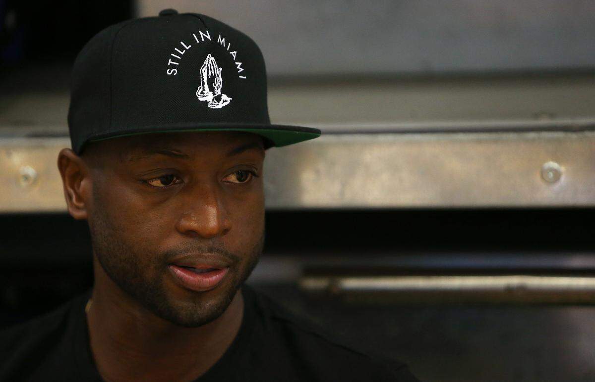 Miami Heat guard Dwyane Wade speaks with the media after the third day of the Miami Heat training camp at FAU Arena on Thursday, Oct. 1, 2015, as the team prepares for the 2015-16 NBA season.
