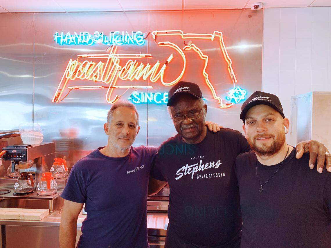 Henderson “Junior” Biggers was with Stephen’s Deli through eight owners, including for 41 years alongside the family of Scott Nadelman, left, and the current owner, Matt Kuscher.