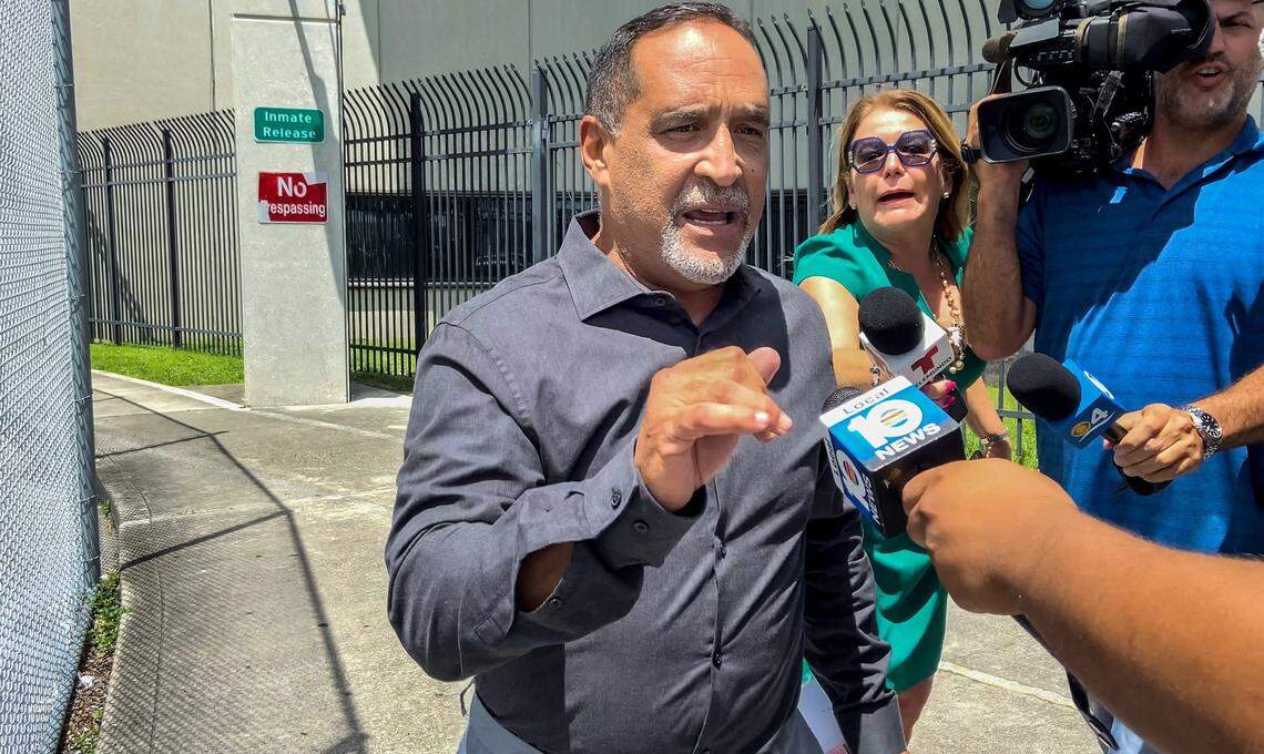 Miami-Dade Commissioner Joe Martinez talks briefly with the media as he walks out of the Miami-Dade Turner Guilford Knight Correctional Center near Doral on Tuesday afternoon.