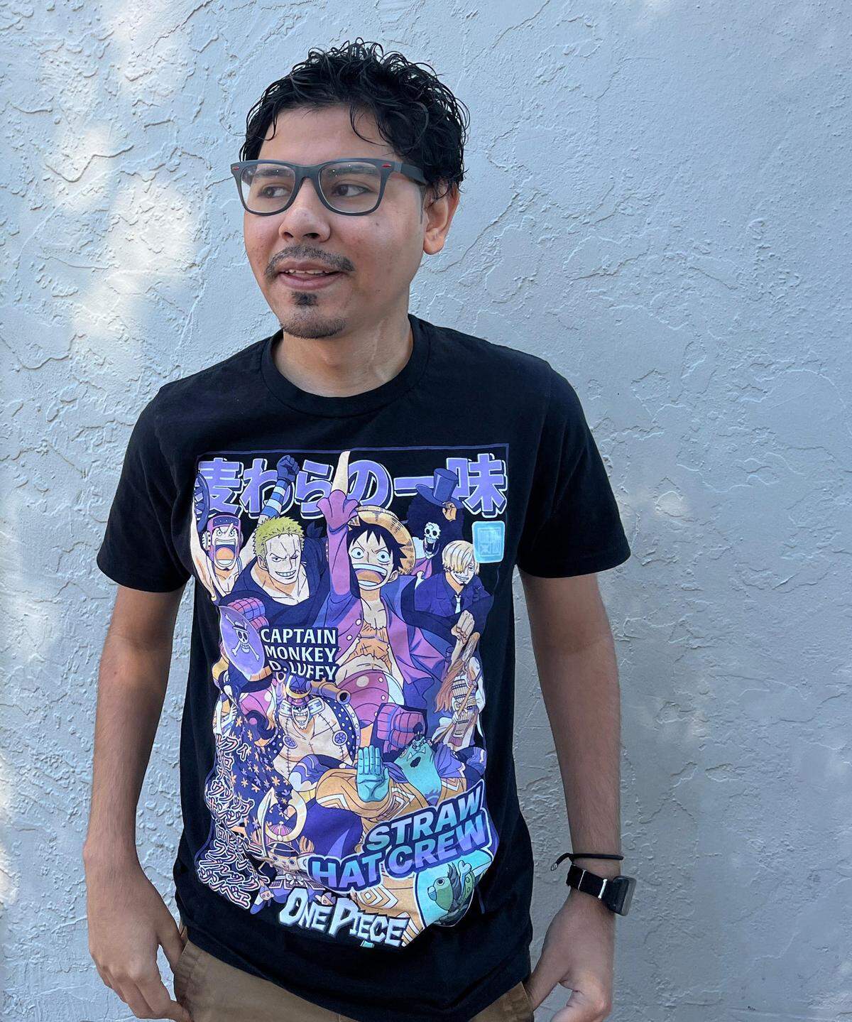 Christian Cerrato, 24, wears a T-shirt featuring 'One Piece,' one of his favorite anime series.