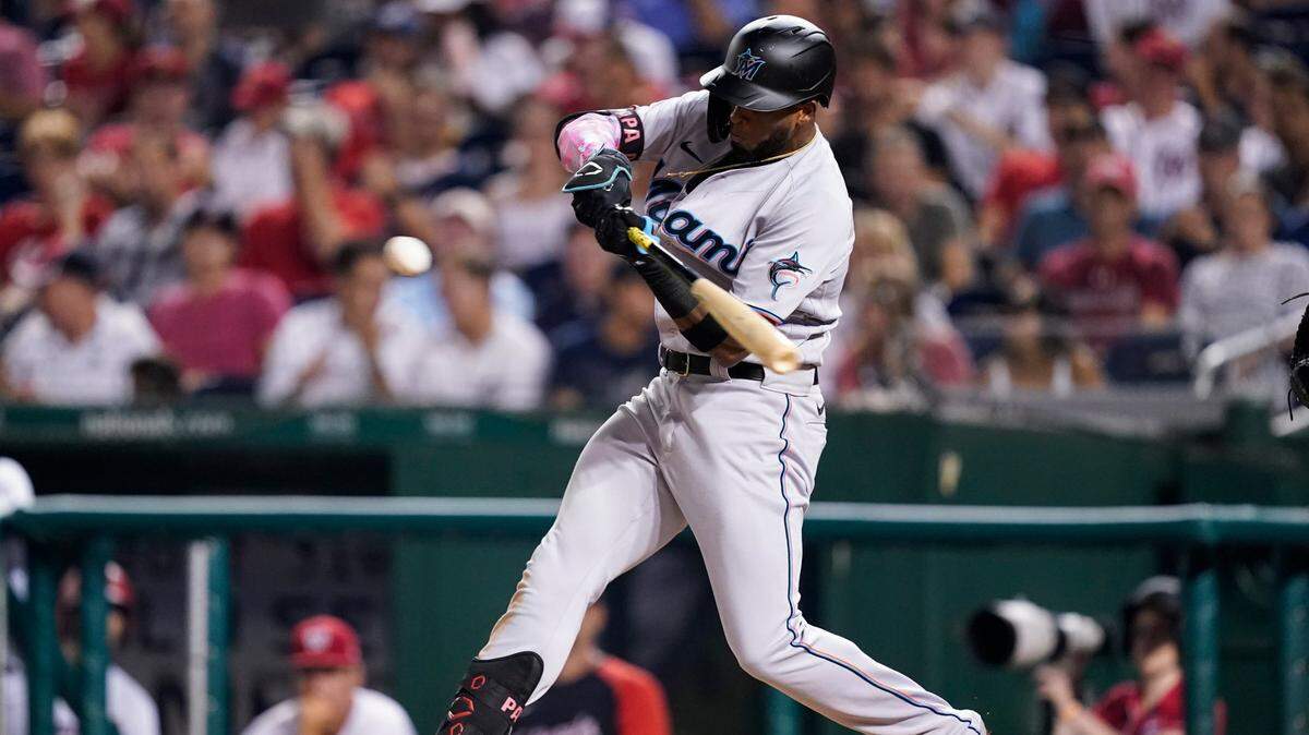 Miami Marlins’ Lewin Diaz hits a solo home run during the fifth inning of a baseball game against the Washington Nationals at Nationals Park, Tuesday, Sept. 14, 2021, in Washington.