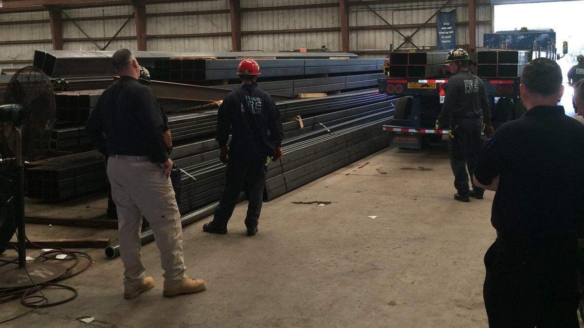 The victim of Monday morning’s tragedy is between the truck and the pile of steel beams to the left of the truck.