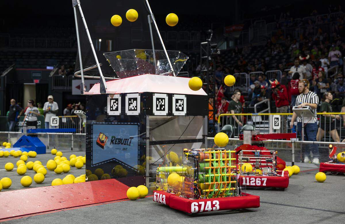 Students from Team 6743 Tiger Engineering and Team 11267 MASAL participate in the 2026 FIRST Robotics South Florida Regional Competition at the University of Miami’s Watsco Center on Friday, April 10, 2026, in Coral Gables, Fla. Participants from local school districts, surrounding states, and international teams are competing for an opportunity to earn a spot at the 2026 FIRST World Championship.