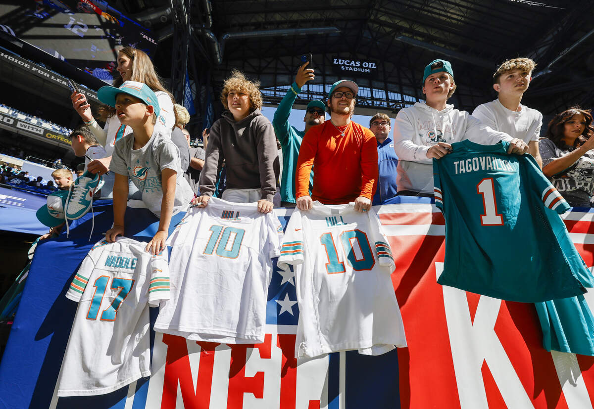 Miami Dolphins fans cheer on their team before Sunday’s game against the Indianapolis Colts at Lucas Oil Stadium in Indianapolis, Sept. 7, 2025.