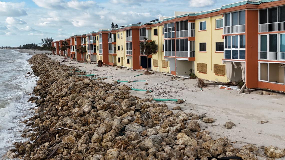 Storm surge and wind from hurricanes Helene and Milton caused beach erosion and damaged condos at Fisherman’s Cove beach front condominium rentals on Siesta Key, Florida on Thursday, October 10, 2024.