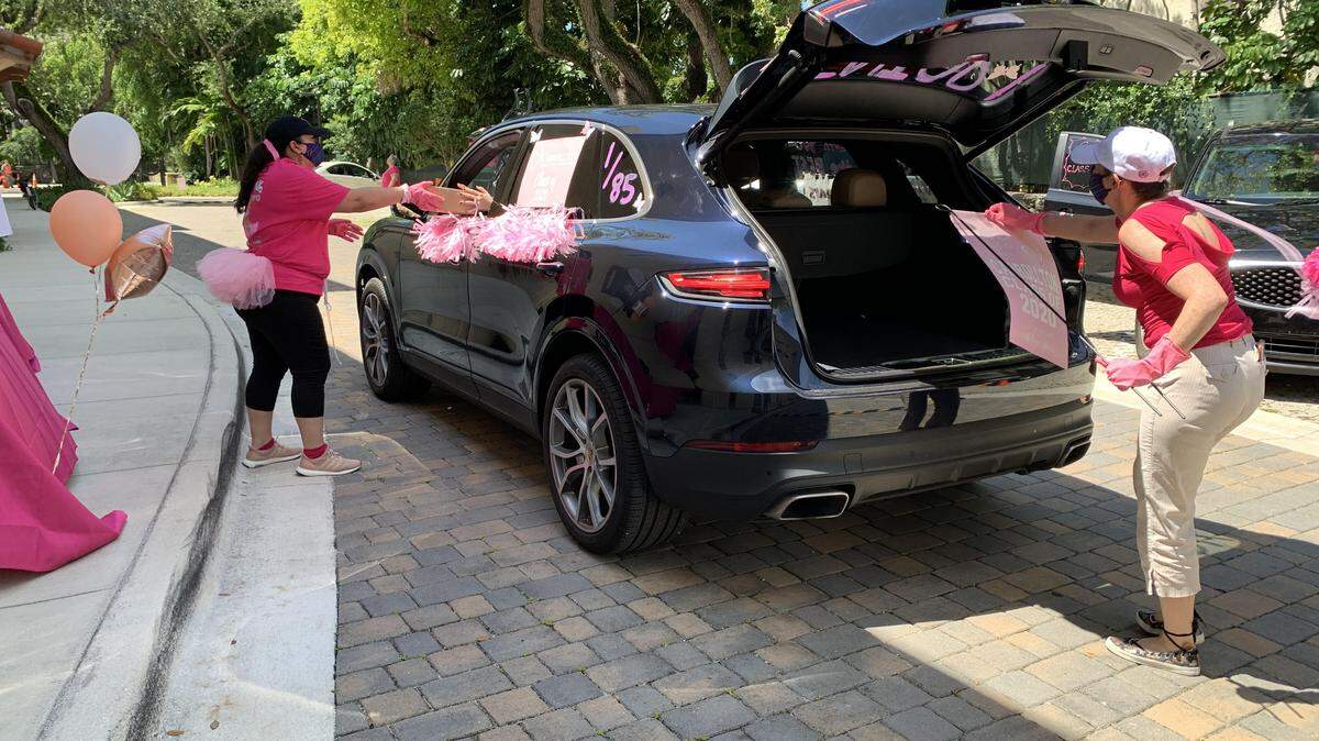 Faculty and staff at Carrollton School of the Sacred Heart in Coconut Grove celebrated the Class of 2020 by hosting a caravan parade with balloons and cheerful signs. Each senior also received handcrafted care packages.